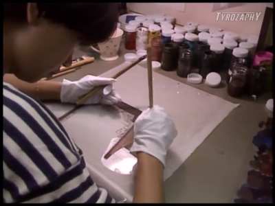 The animators from behind the scenes of "AKIRA" (1988), showing the process of hand-painting the backgrounds and individual cel animations