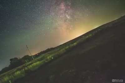 Earth's rotation on a stationary camera.