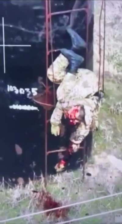 Russian soldier meets a remote mine at the end of a ladder. (NSFW)
