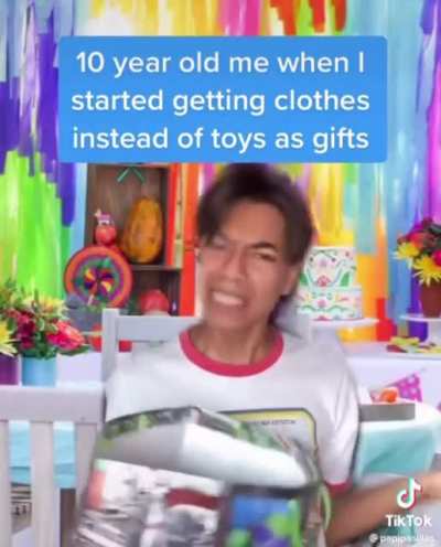Giving a child clothing for their birthday..