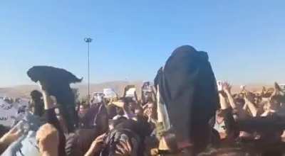 Women of Iran removing their hijabs while screaming "death to dictator" in protest against the assasination of a woman called Mahsa Amini because of not putting her hijab correctly
