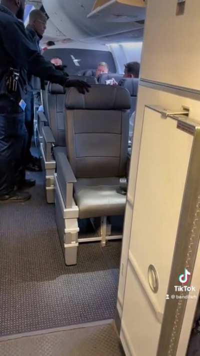 Man forcibly removed from flight after refusing multiple requests to leave from attendants, pilot, and police. All started over being denied a pre-takeoff gin and tonic.