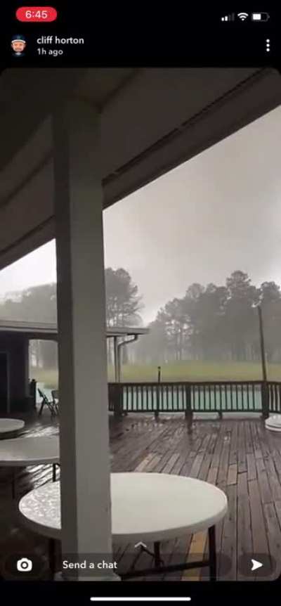 "Well, there goes the roof" - Man anchored to patio by his enormous balls