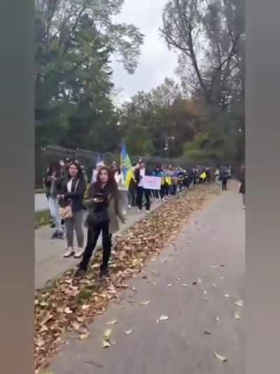 A 'referendum to annex the embassy grounds and incorporate them into the city' is underway outside the Russian embassy in Warsaw. A long queue has formed at the site