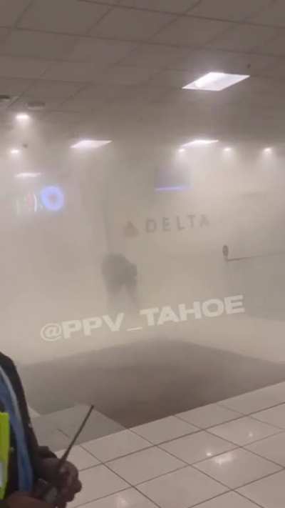 Woman sprays fire extinguisher in Atlanta International Airport