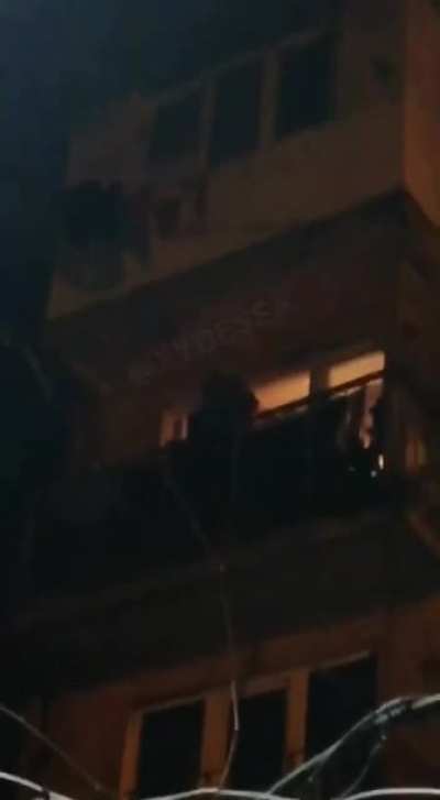 Babushka screaming "American Mercedes" from the balcony