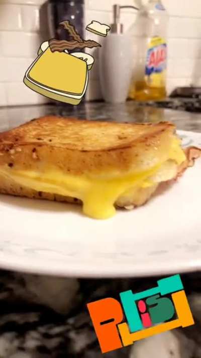 Meet the Split-Open-And Melt: a double decker, garlic butter grilled ham and cheese