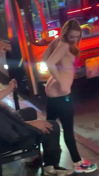 Redhead gives a lap dance to a stranger at the bus stop!