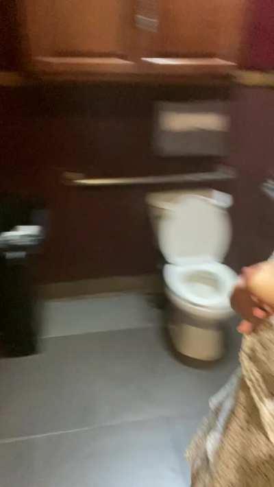 Flashing in a dirty bar bathroom