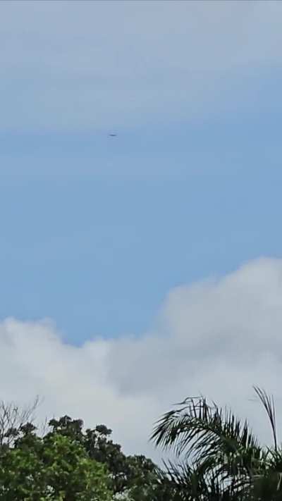 Daylight Metallic UFO Disk Caught on Camera &mdash; Vanishes With No Radar Record