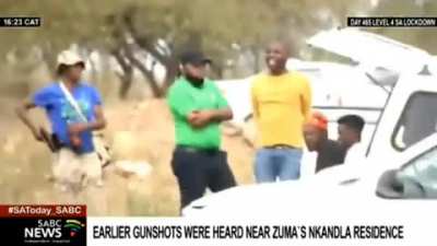 Beer available at Nkandla? Man drinking black label while shooting.