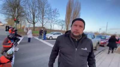 "Activists" block a road in Germany. Man freaks out because he has to go to work.