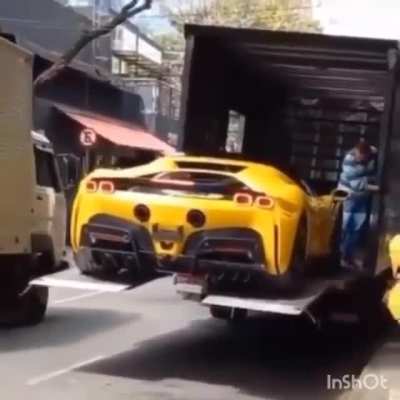 Brand new Ferrari SF90 worth half a million usd falls from delivery truck in S&atilde;o Paulo, Brazil