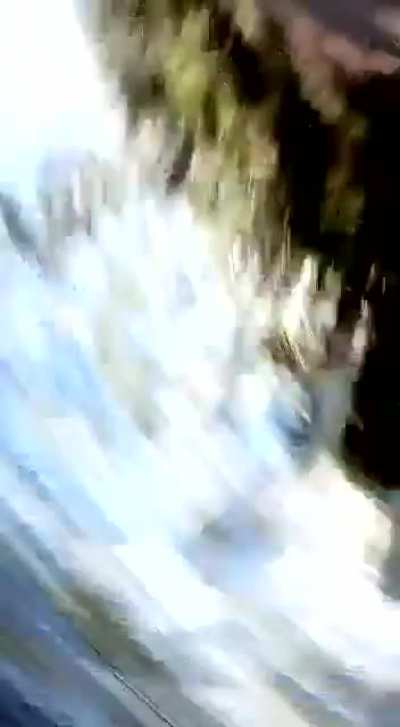 Let me shoot this video of me riding a Scooter on the way to the beach
