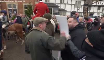 Fox hunters clashing with animal rights protesters. [UK]
