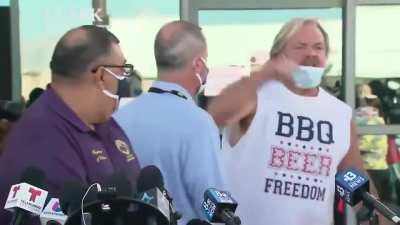 Crazy conspiracy guy interrupts news interview