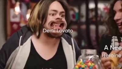 Man shouting &ldquo;more&rdquo; while candy is poured into his mouth