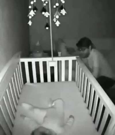 Pranking his baby.