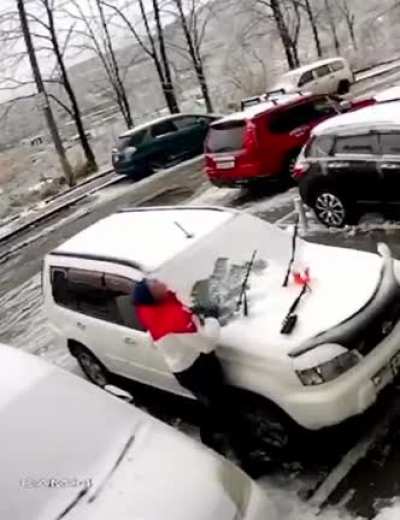 "Let me randomly film this guy removing snow off his car &ndash; tilted."