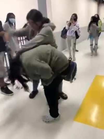 Green girl was talking, and grey "confronted" her