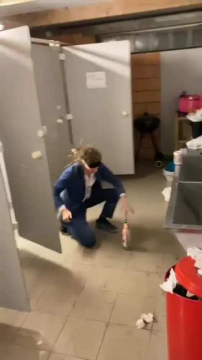 lighting fireworks in a toilet