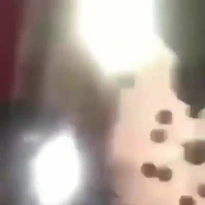 Man disrupts a funeral then smacks the dead body.