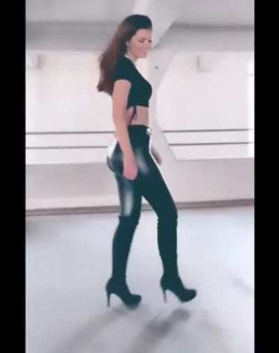 Lara Winter modeling her shiny pants