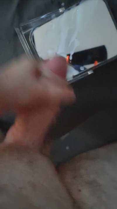 Cumming over a mirror 