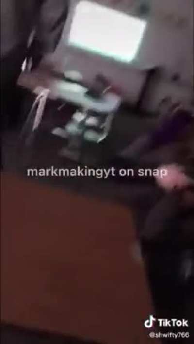 Video from inside Oxford High School, where multiple people were shot today, of students trying to figure out if the man outside is police or the shooter