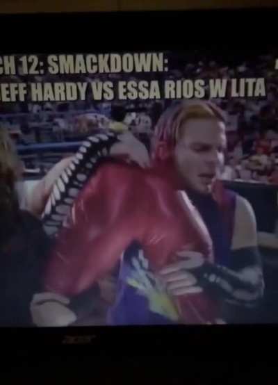 Lita being carried away by the Hardy Boyz