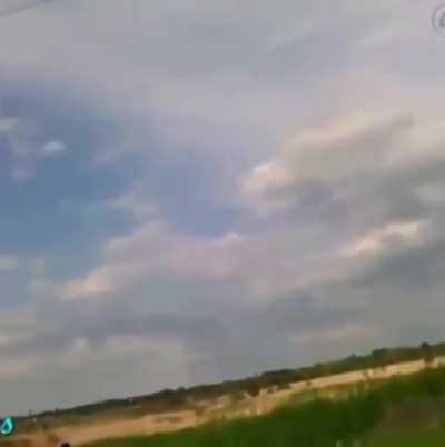 Guy wraps rocks with copper wire and throws them at power lines