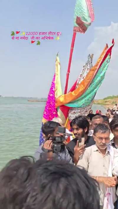 One full tanker milk offered to narmada river so that fishes and drink milk .