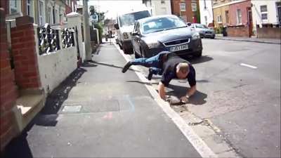Man tries to kick cyclist's rear tire, ends up falling on face
