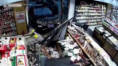 Car crash into convenience store