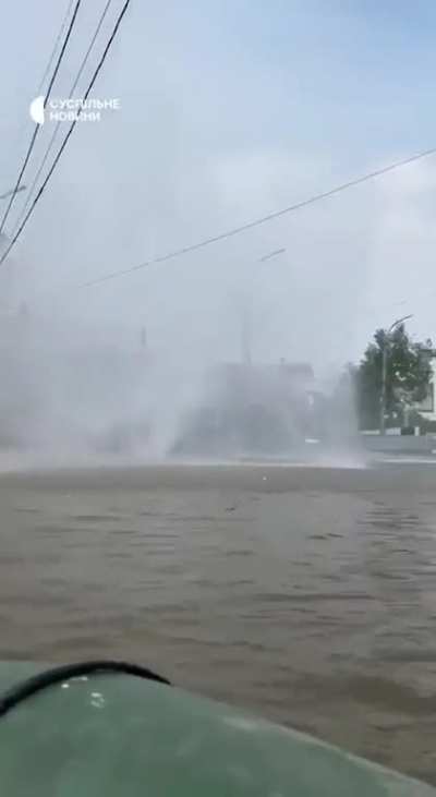 Russian artillery shell barely misses people trying to evacuate from the flooded southern part of Kherson city
