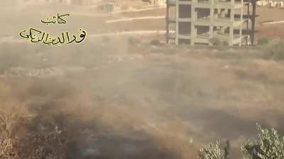 FSA HJ-8 "Red-Arrow" team targets an SAA tank, causing an immediate cook-off - Aleppo - 6/21/2013