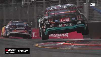 Australian Supercars launch off the curbs at Surfers Paradise.