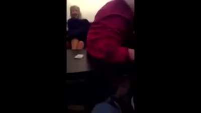 Man smashes his head through table