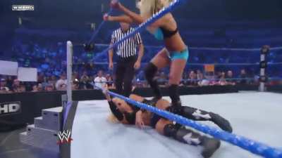 Kelly Kelly stomping a mudhole in Michelle McCool