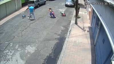 Man attacks woman for defending herself against his loose dogs