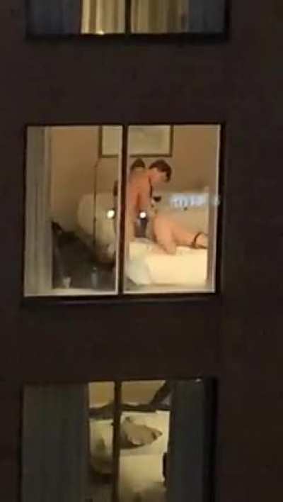Couple forgets to close the blinds.