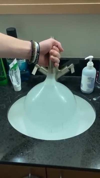 Filling up a condom with water