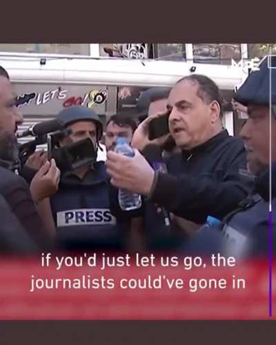 The owner of the Gaza media headquarters tower pleads with Israeli official on live TV to let journalists collect their gear. Moments later, air strikes demolish the building that housed several international media offices, including Associated Press.