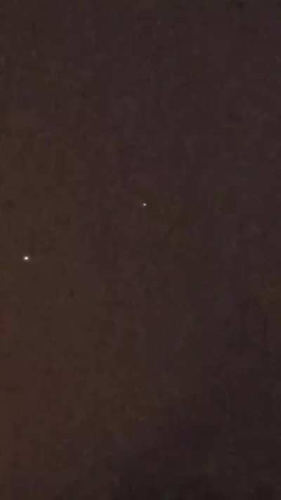 Please explain? 8 PM Central time, Fayetteville AR. Notice the stationary light that moves while the other passes by it.