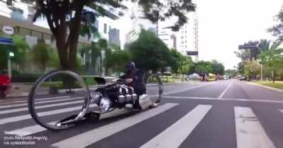 Hubless motorcycle with an airplane engine built by retired F1 driver.