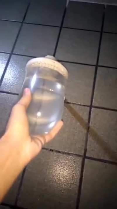 Putting a condom on the shower head