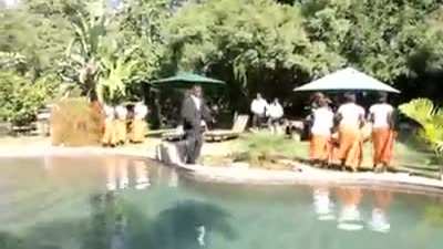 WCGW making a music video next to a swimming pool