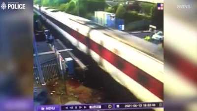 Horrific moment a drink-driver smashes his Range Rover into a speeding train causing numerous injuries, &pound;345,000 worth of damage and delays to the rail network. Further details in comment below.