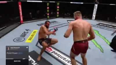 Domick Reyes threatens Jan Blachowicz to get in to his guard, Jan backs up to keep the fight standing.