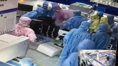 Chinese Workers Stand Still Like Robots While Fellow Co-Worker Tries To Kill Another Assassin&rsquo;s Creed Style!